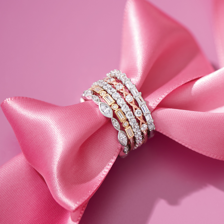 Stacked diamond bands in white, yellow and rose gold.
