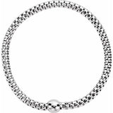 Silver beaded bracelet on a white background