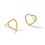 Gold heart-shaped earrings on a white background