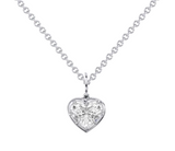 Heart-shaped diamond pendant on a chain against a white background